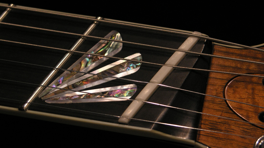 Novax Guitars: AX6 Koa Top 6-string